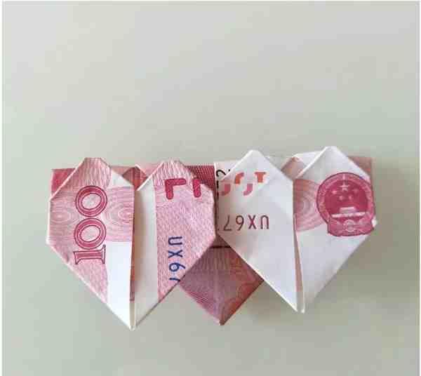 一百元怎么折爱心 爱心的折法(简单)100元